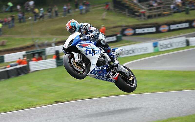 Motorcycle Racer in Mid-air — Blue