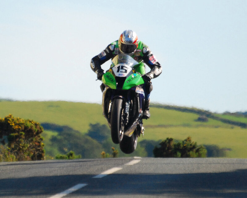 Motorcycle Racer in Mid-air — Green, Dynamic