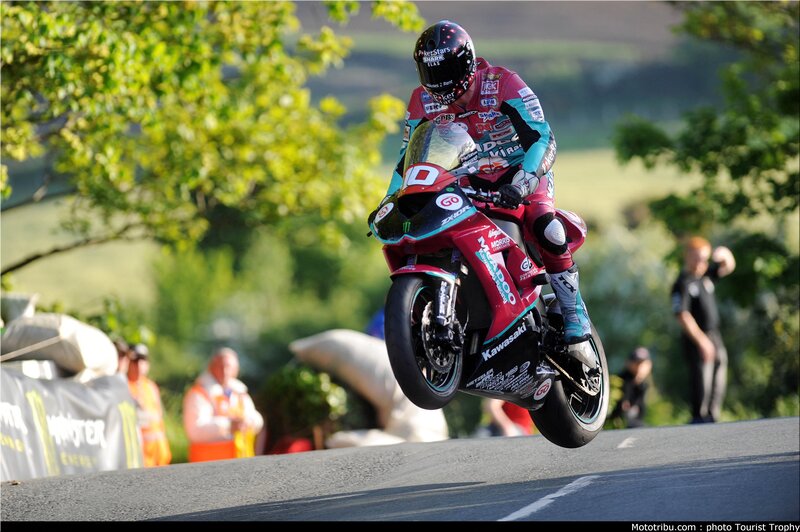 Motorcycle Racer in Mid-air — Red
