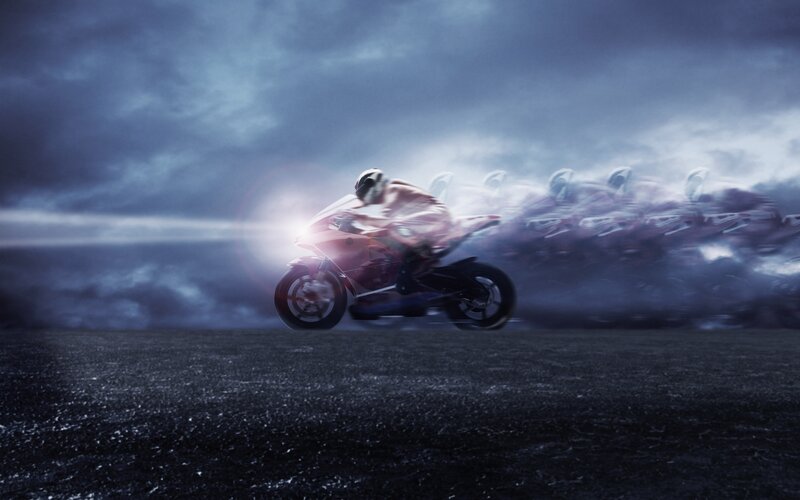 Motorcycle Racer in Motion — Blue, Dramatic