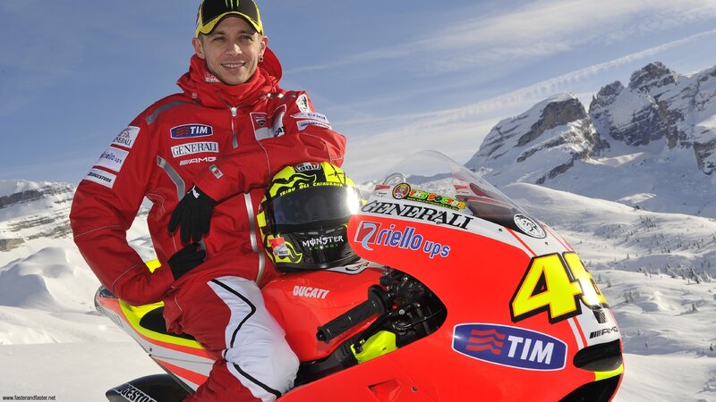 Motorcycle racer in snowy mountains