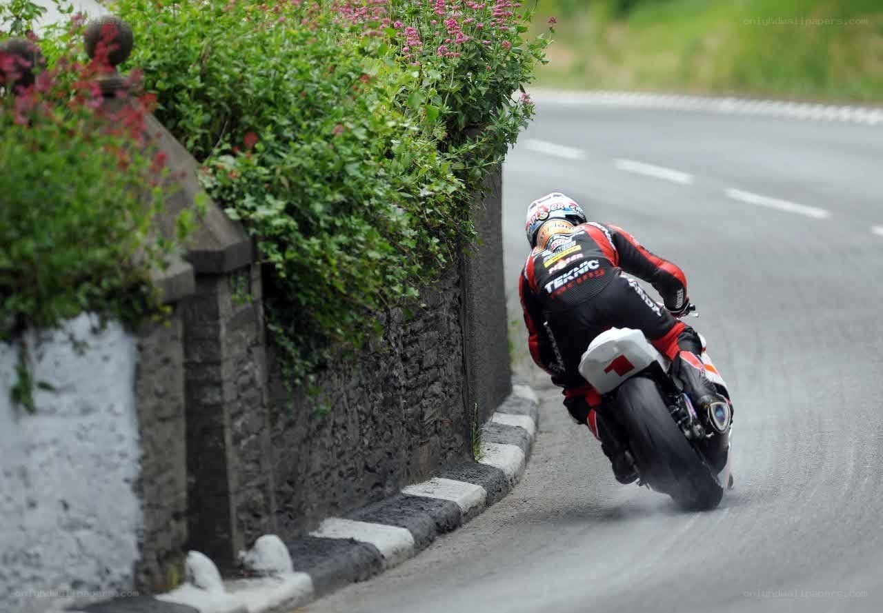 Motorcycle racer on a curve