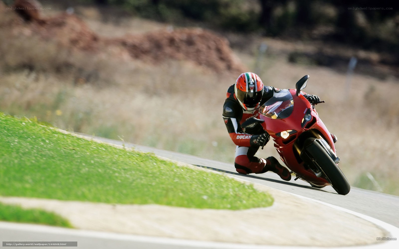 Motorcycle racer on a curve