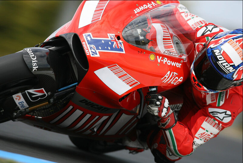 Motorcycle racer on a red bike