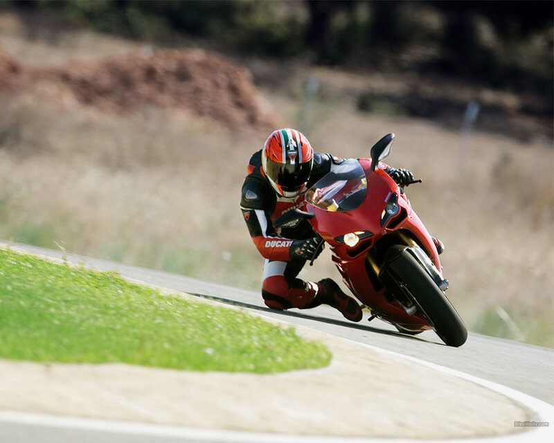 Motorcycle racer on a red bike