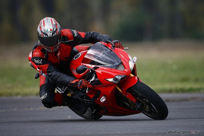 Motorcycle racer on a red bike