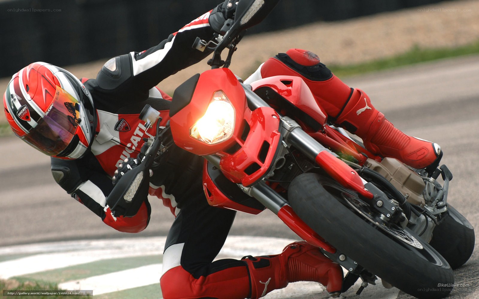 Motorcycle racer on a red bike