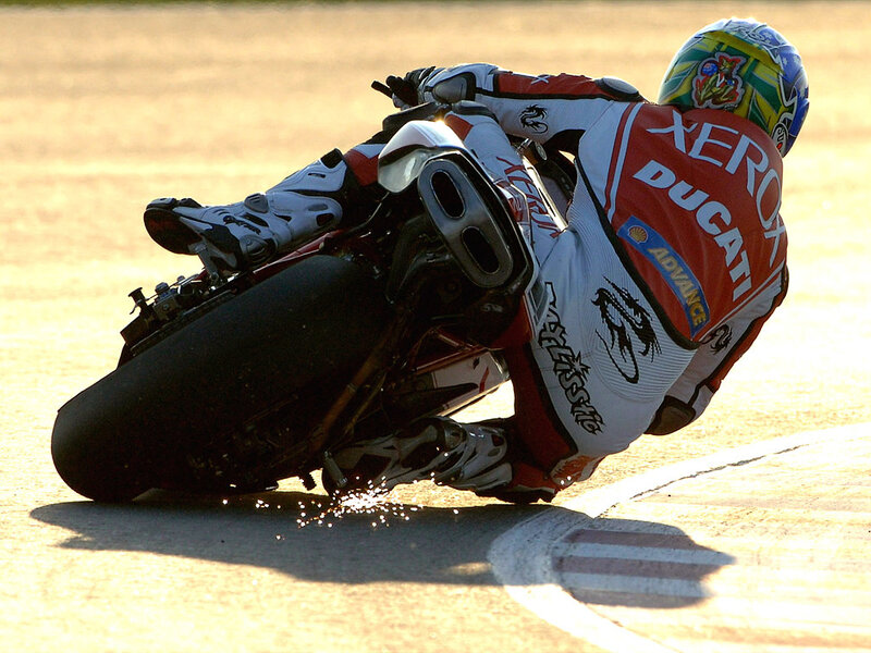 Motorcycle racer on a turn