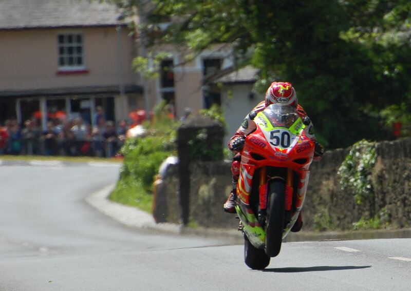 Motorcycle racer on a winding road
