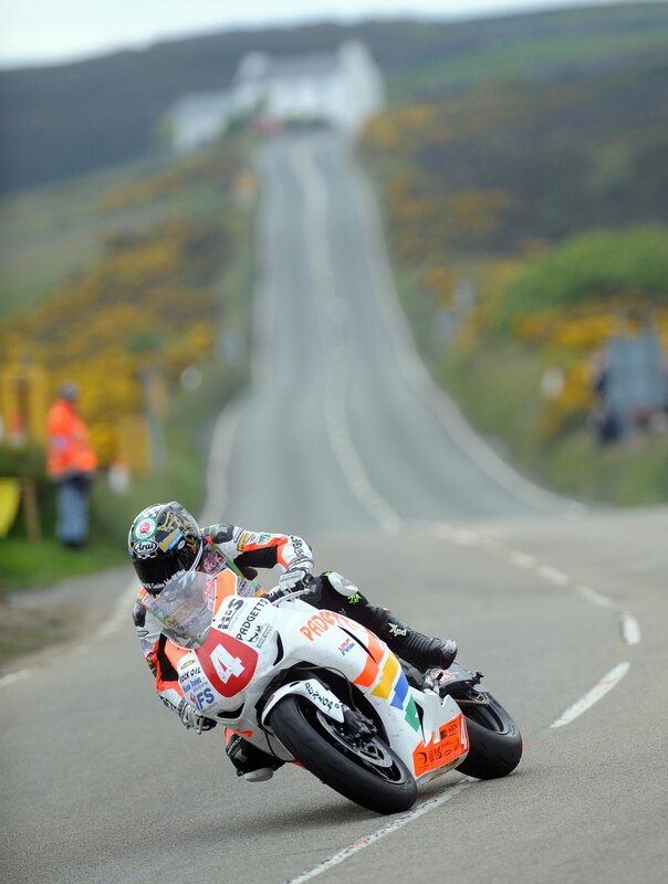 Motorcycle racer on a winding road
