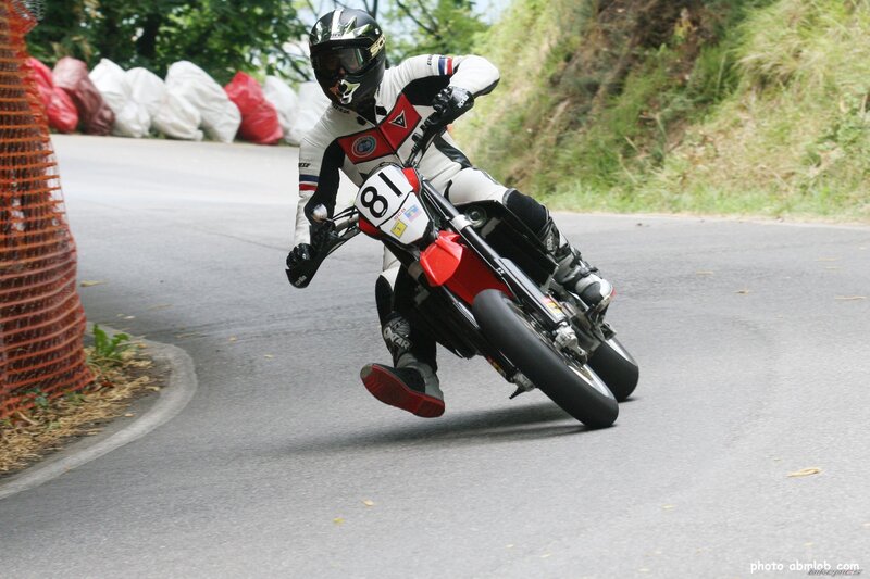 Motorcycle racer on a winding road