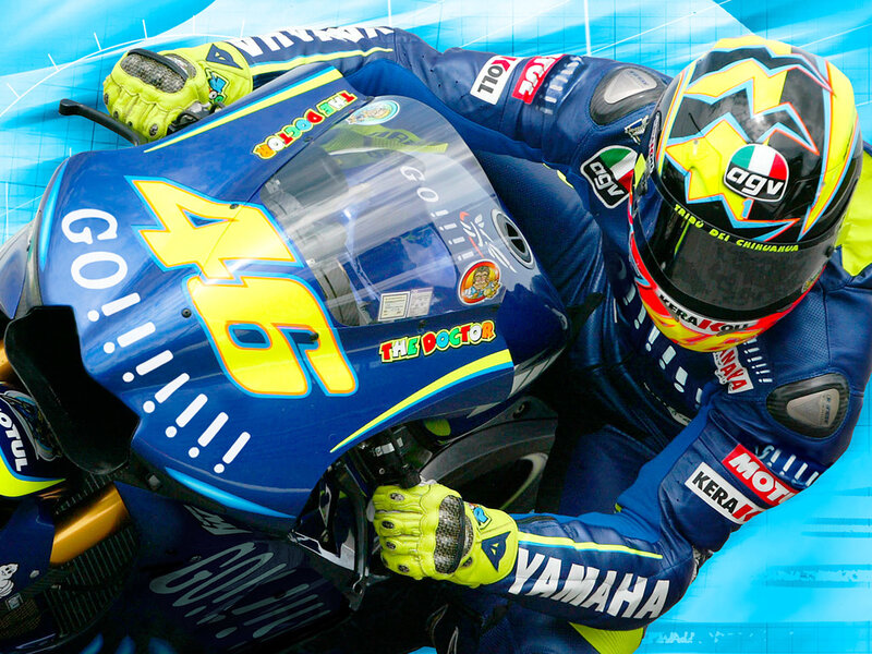 Motorcycle Racer on Bike — Blue, Dynamic, Photograph, Racing Suit, Helmet, Yamaha Motorcycle