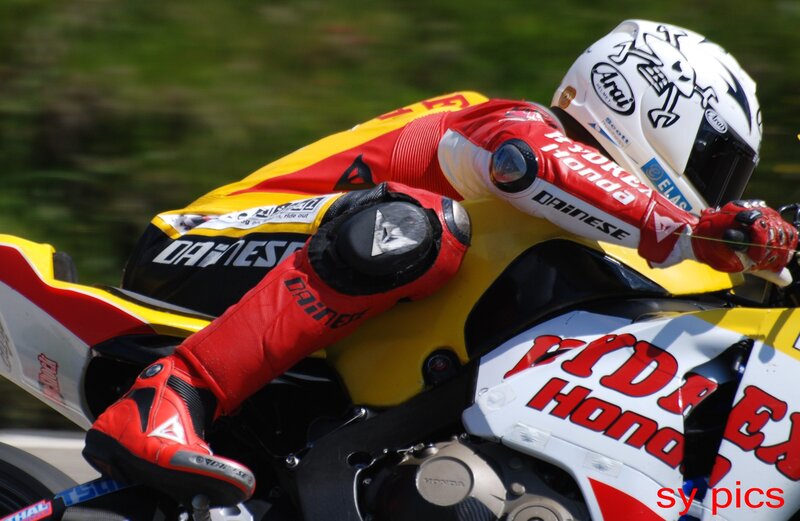 Motorcycle Racer on Bike — Red