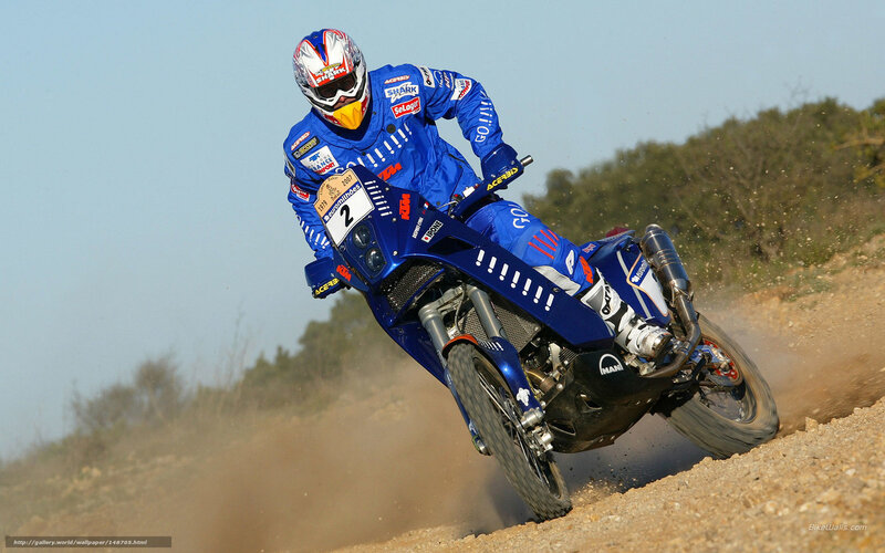 Motorcycle racer on dirt track