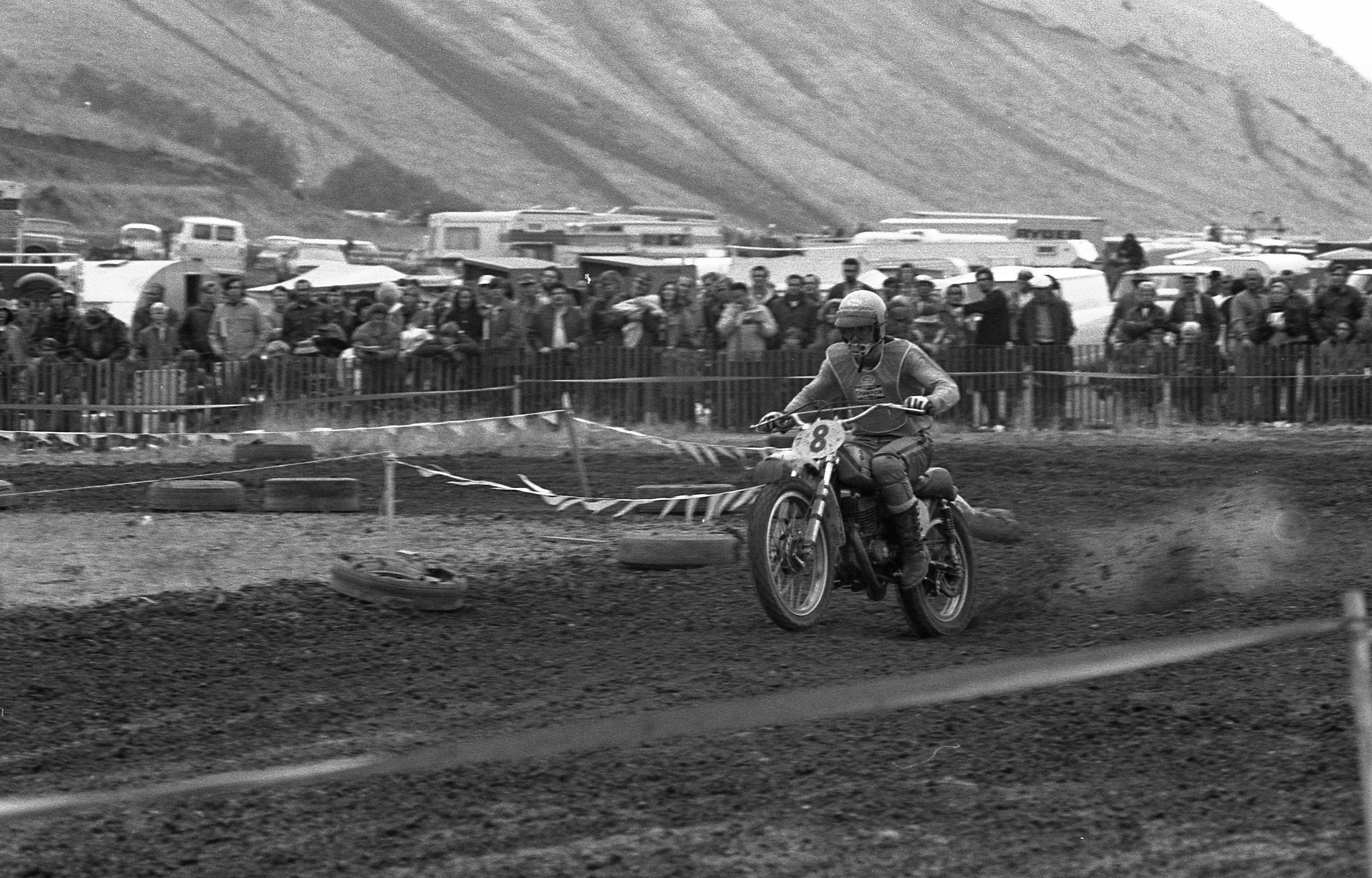 Motorcycle racer on dirt track