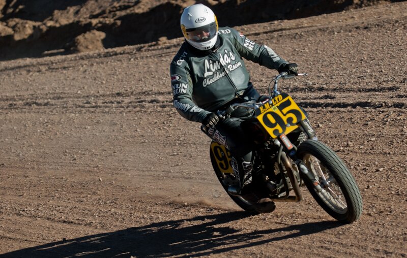 Motorcycle racer on dirt track