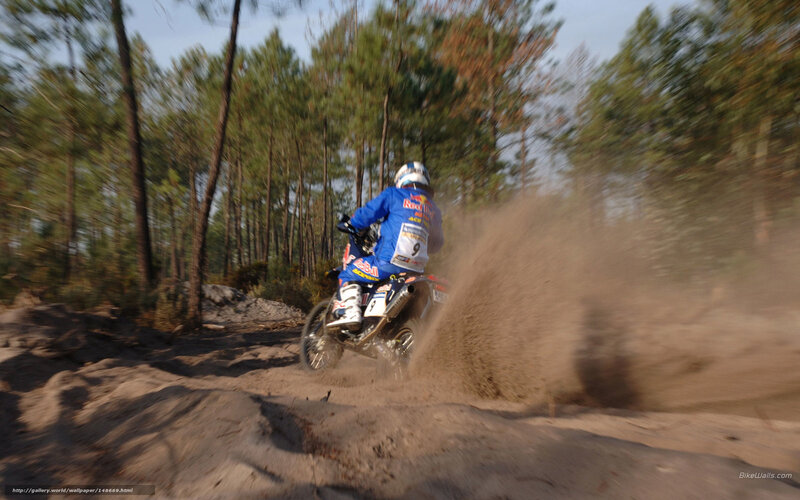 motorcycle racer on dirt trail