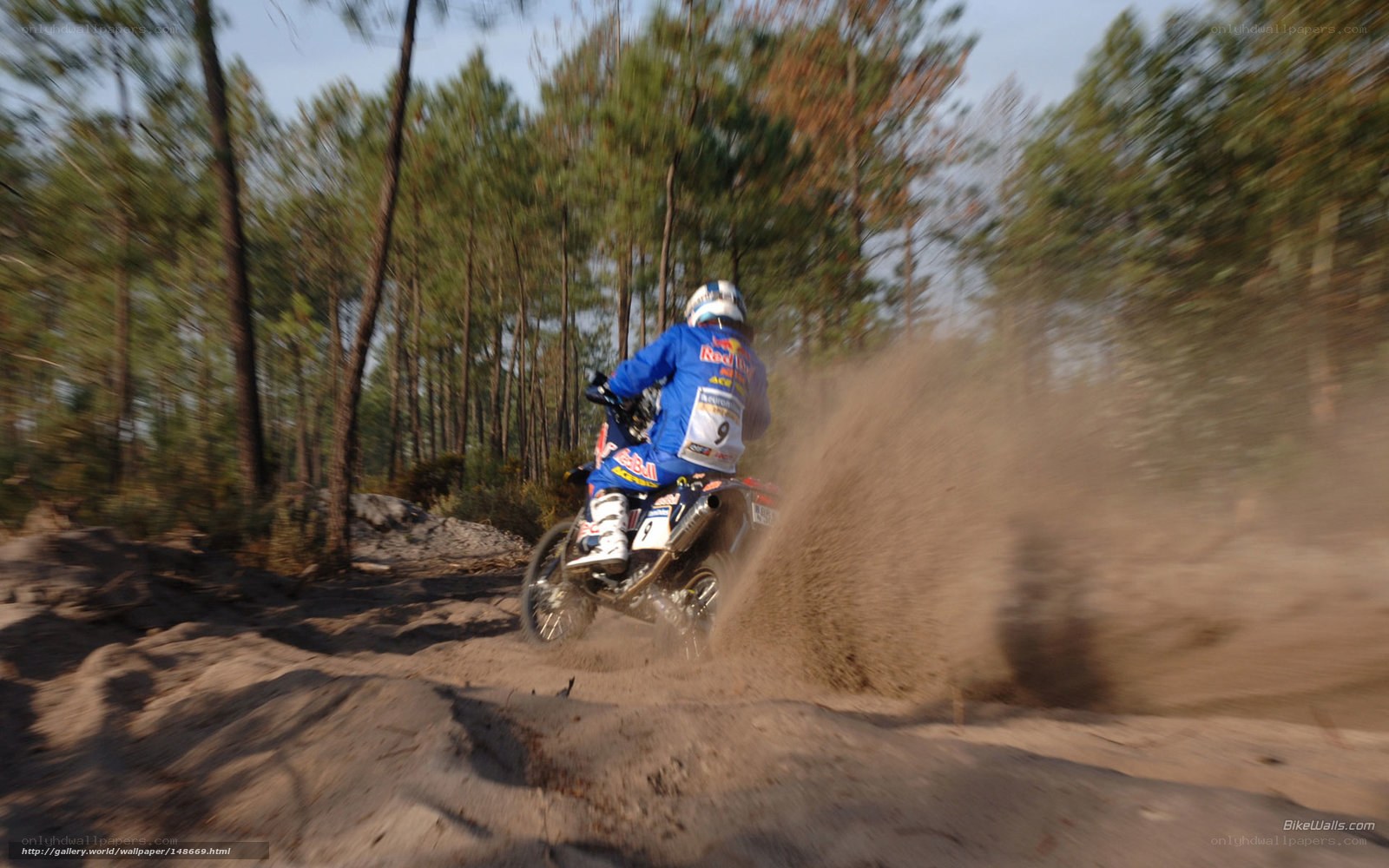 motorcycle racer on dirt trail