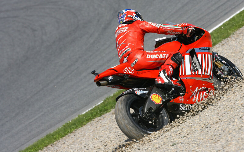 Motorcycle racer on gravel