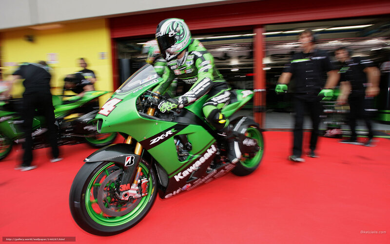 motorcycle racer on green bike