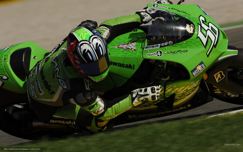 motorcycle racer on green bike