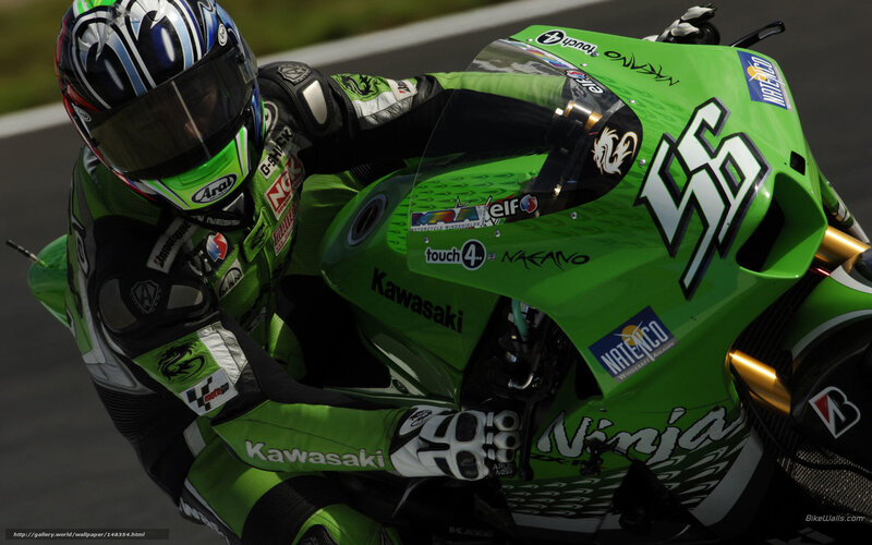 motorcycle racer on green bike