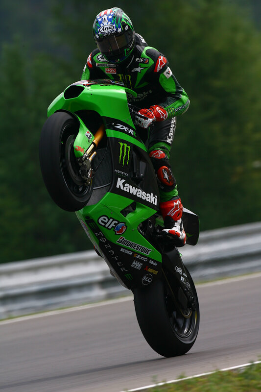motorcycle racer on green bike