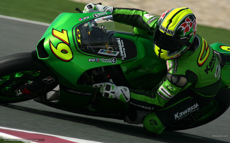 motorcycle racer on green bike