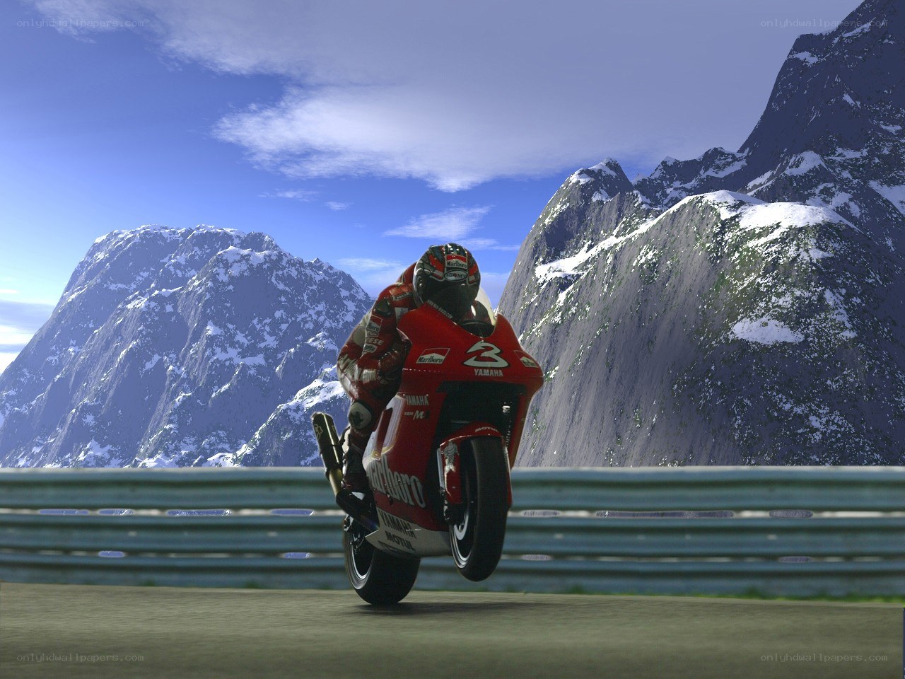 Motorcycle racer on mountain road