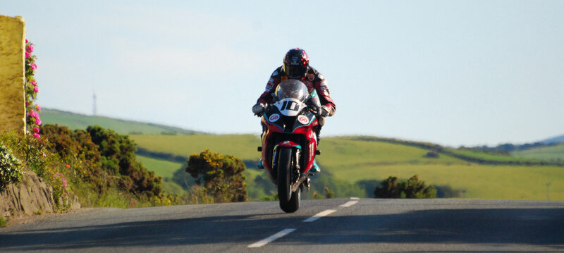 Motorcycle Racer on Road — Green