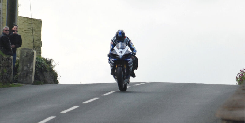 Motorcycle Racer on Road