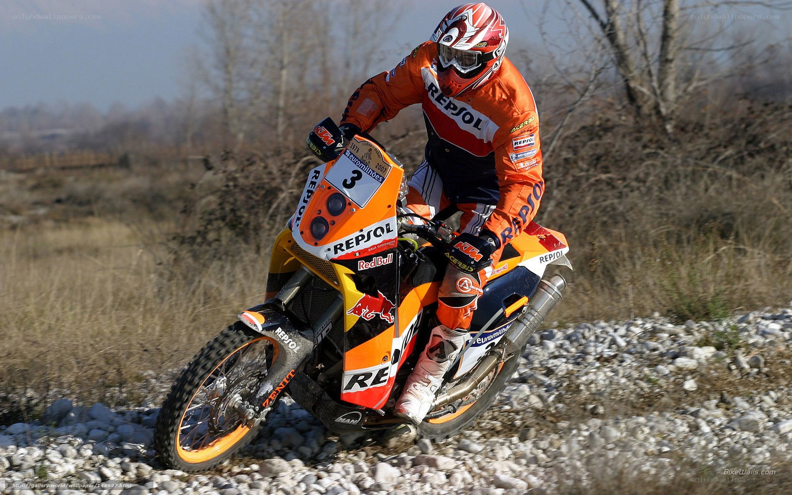 motorcycle racer on rocky terrain
