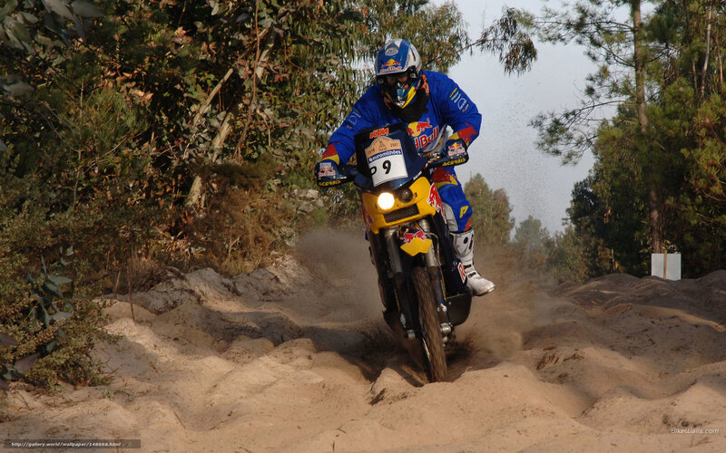 motorcycle racer on sandy track