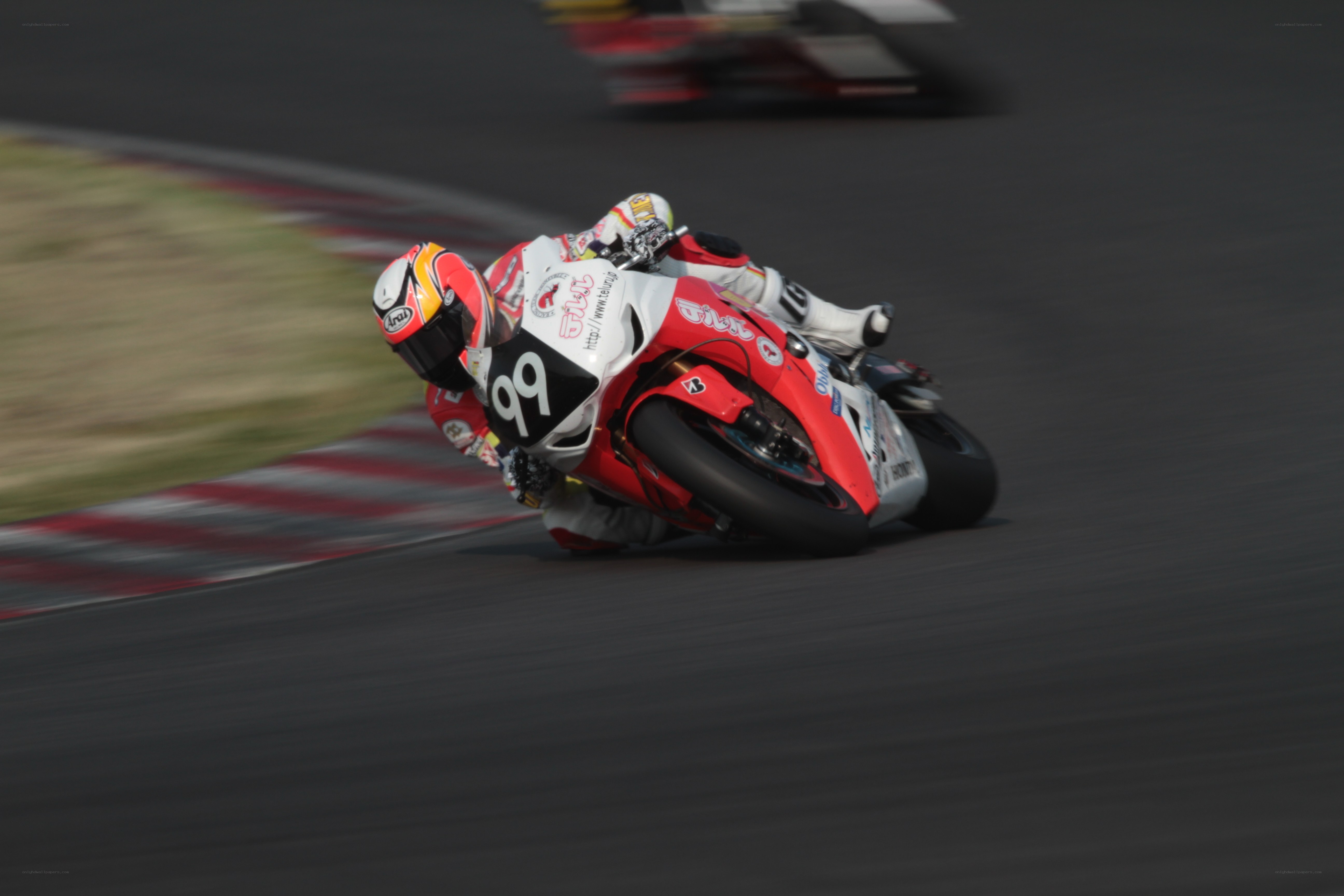 Motorcycle racer on track