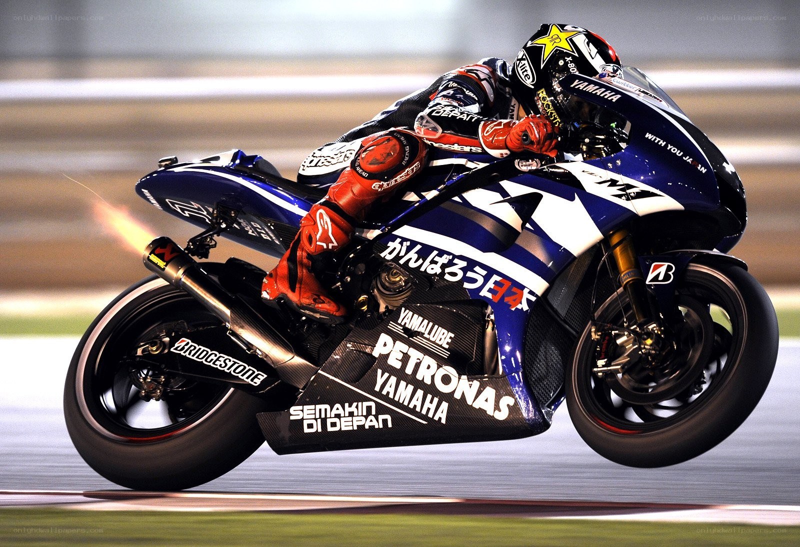 Motorcycle racer on track