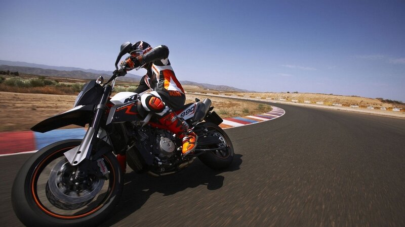Motorcycle Racer on Track — Black, Dynamic, Afternoon, Photograph, Racetrack, Mountains