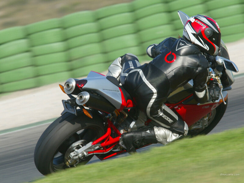 Motorcycle Racer on Track — Black, Dynamic, Afternoon, Photograph, Racing Suit