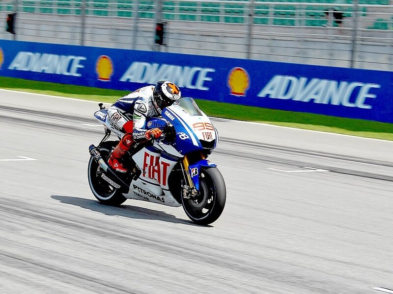 Motorcycle Racer on Track — Blue