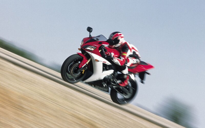 Motorcycle Racer on Track — Dynamic, Rider