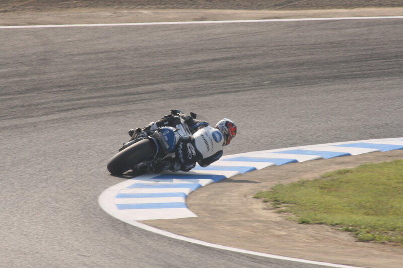 Motorcycle Racer on Track — Gray, Dynamic, Afternoon, Photograph, Racetrack, Grass