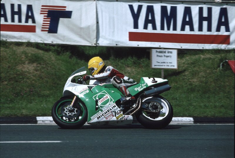 Motorcycle Racer on Track — Green, Dynamic, Afternoon, Photograph, Banner