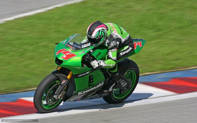 Motorcycle Racer on Track — Green, Dynamic, Afternoon, Photograph, Racing Suit, Helmet, Grass