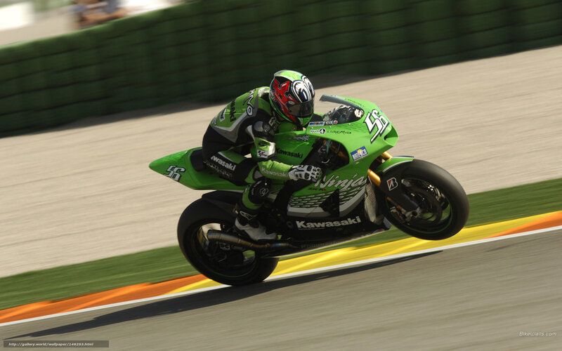 Motorcycle Racer on Track — Green, Dynamic, Afternoon, Photograph, Racing Suit, Helmet, Green Motorcycle