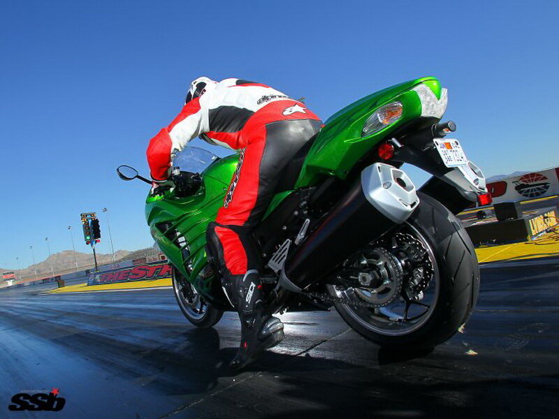 Motorcycle Racer on Track — Green, Dynamic, Afternoon