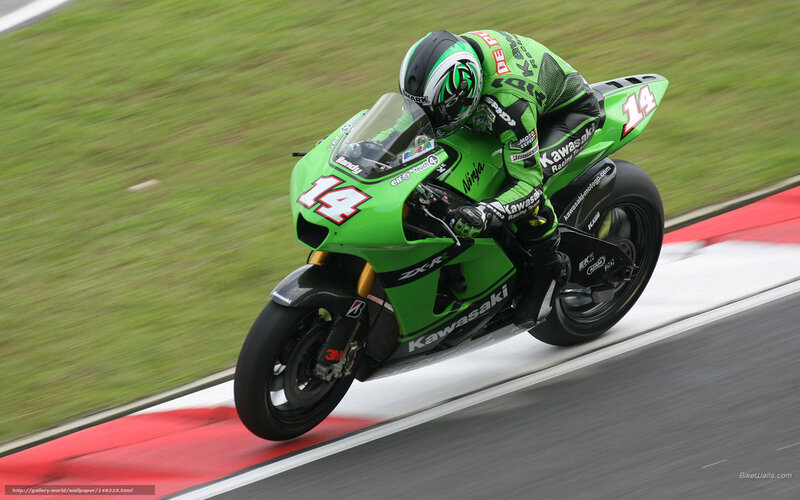 Motorcycle Racer on Track — Green, Dynamic, Photograph, Racing Suit, Helmet, Grass