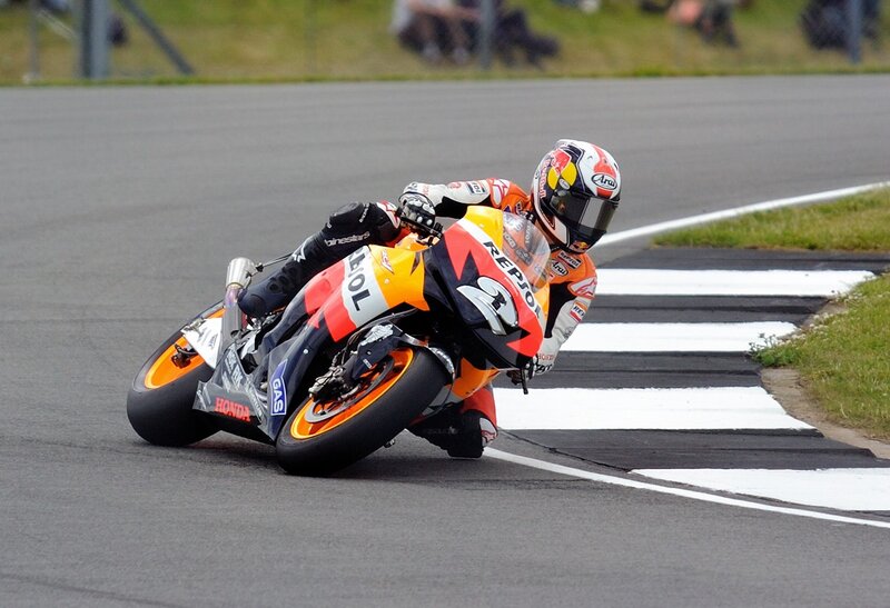 Motorcycle Racer on Track — Orange, Dynamic, Afternoon, Photograph, Helmet, Racetrack