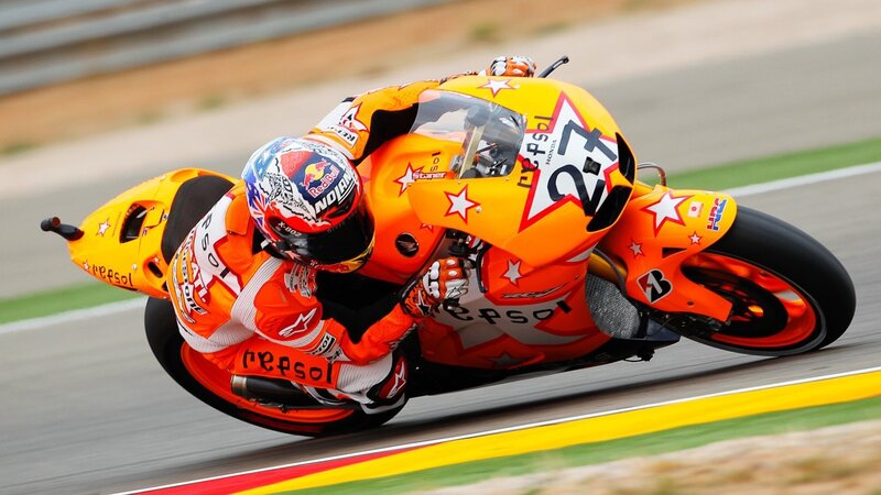 Motorcycle Racer on Track — Orange, Dynamic, Afternoon, Photograph