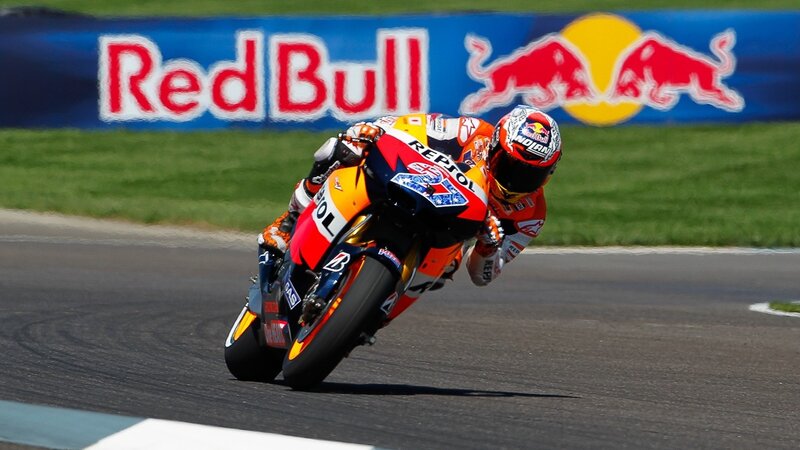 Motorcycle Racer on Track — Orange, Dynamic, Afternoon