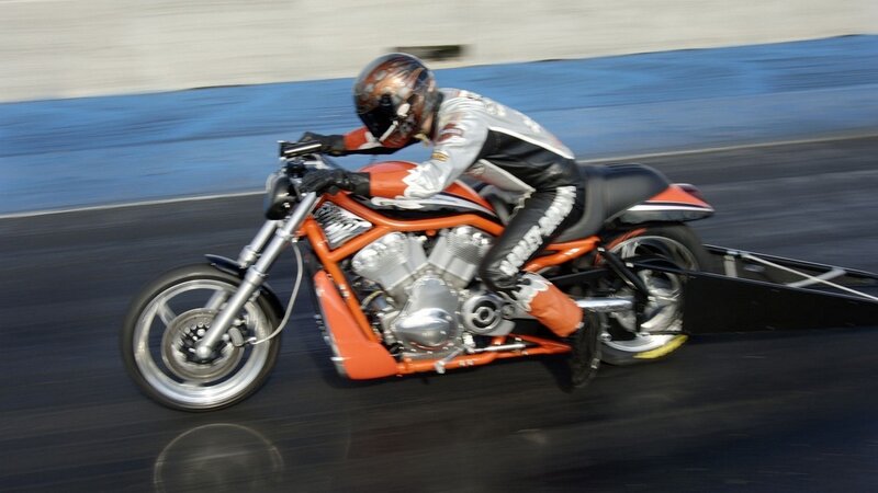 Motorcycle Racer on Track — Orange, Dynamic, Photograph, Black