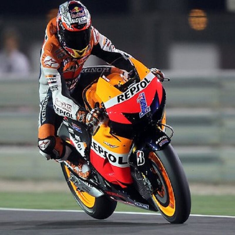 Motorcycle Racer on Track — Orange, Intense